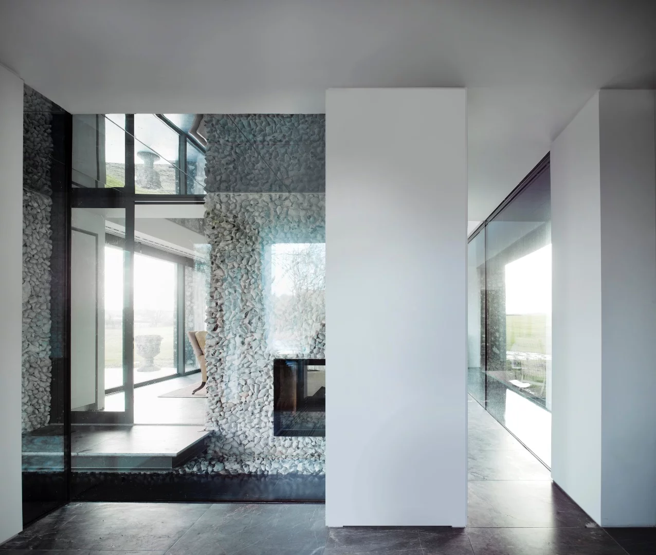 A rug here, an ornament there, and a painting elsewhere help enliven Flint House somewhat