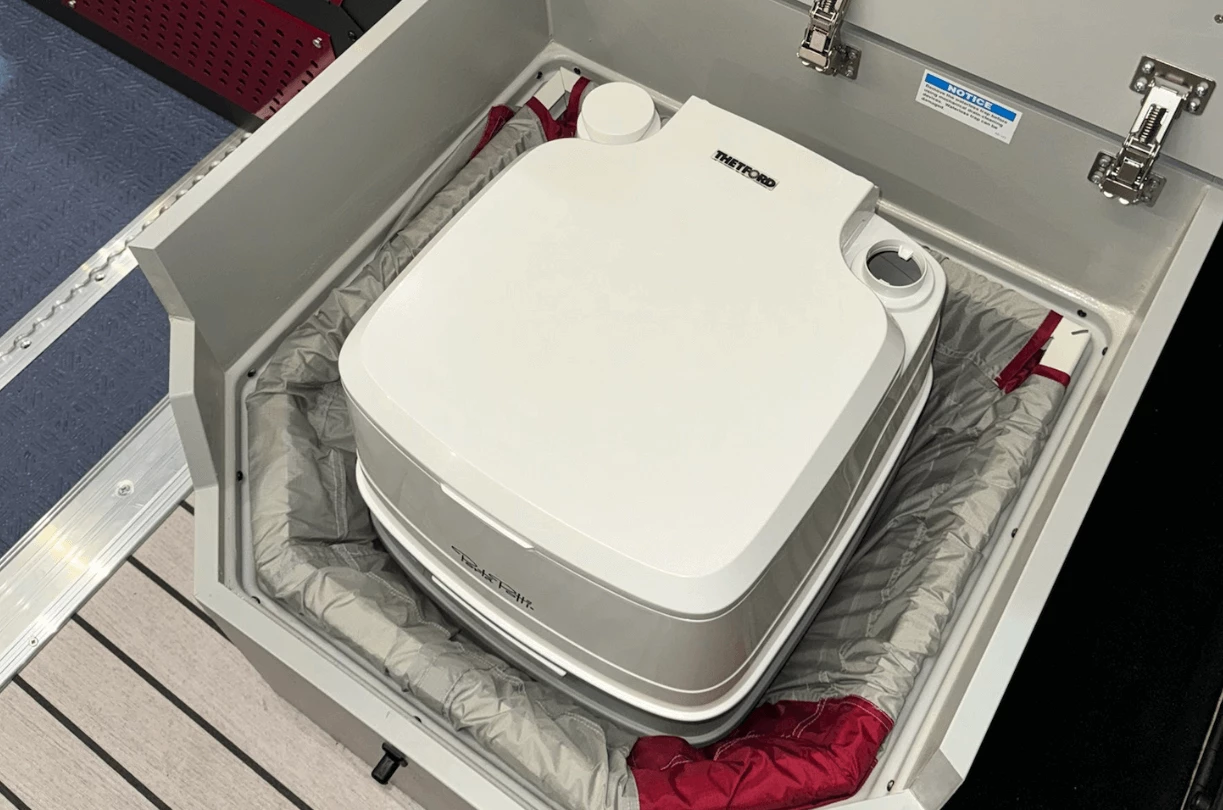 The portable toilet can store away into the closable shower pan box