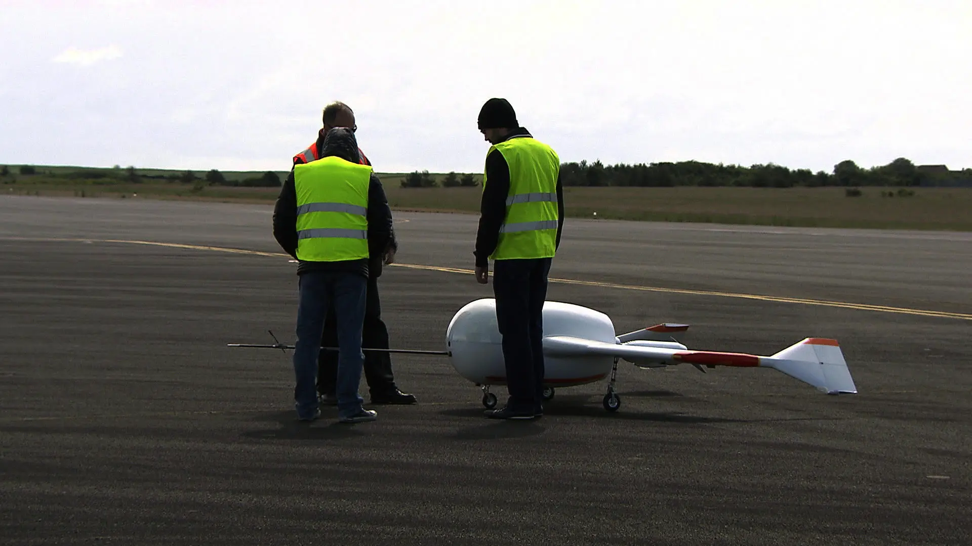 Airbus engineers stand over a Adeline demonstrator