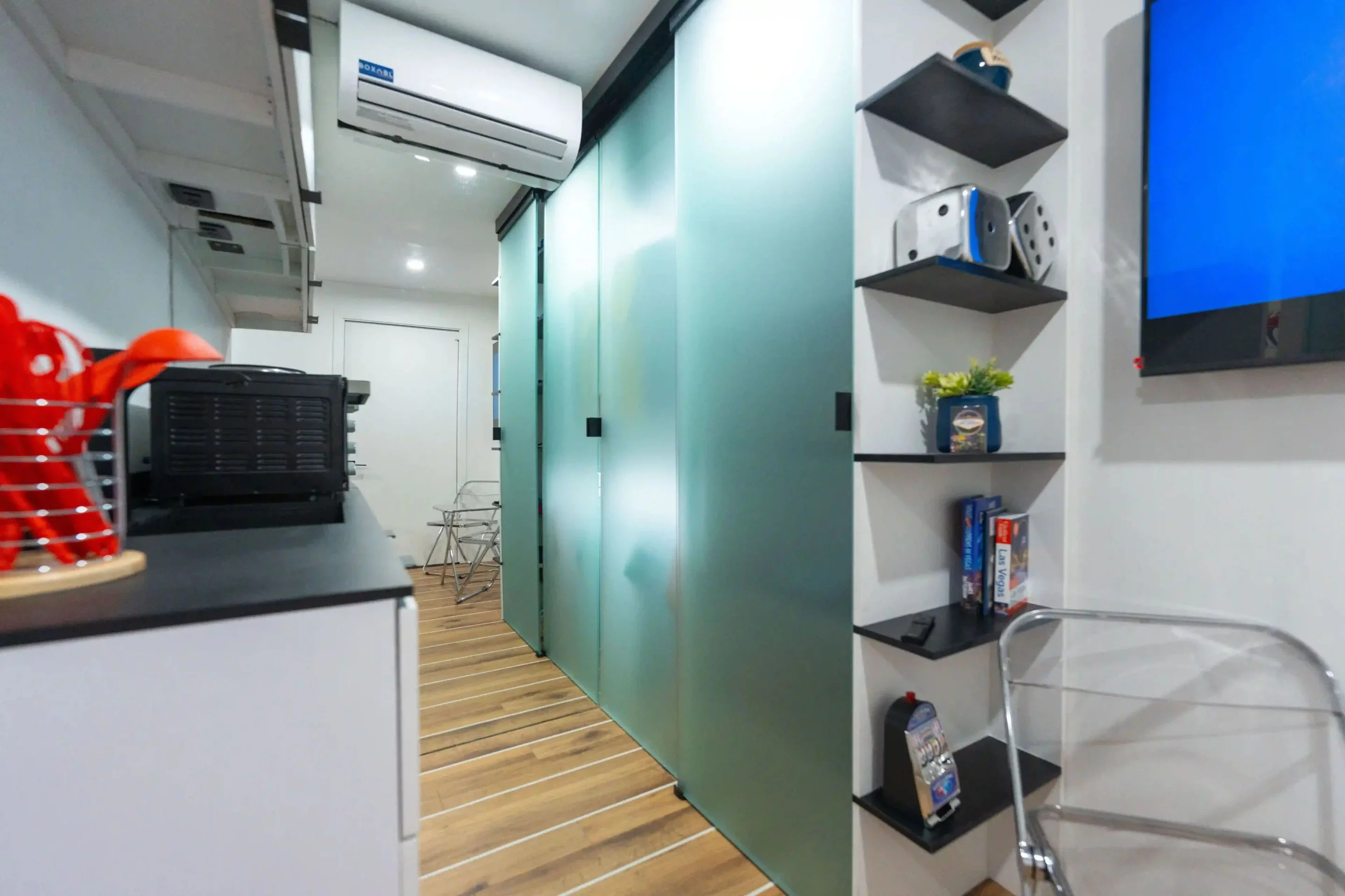 The Baby Box utilizes space well. Here in the kitchen, is a full length closet fo