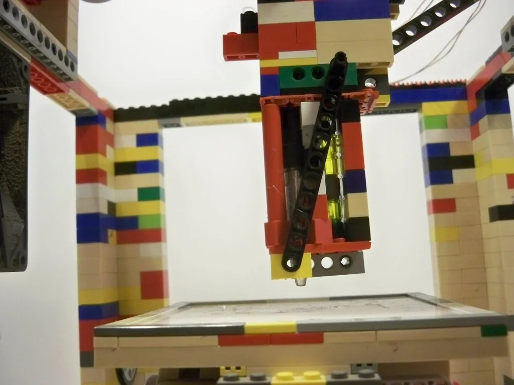 The LEGObot uses a hot glue gun as an extruder