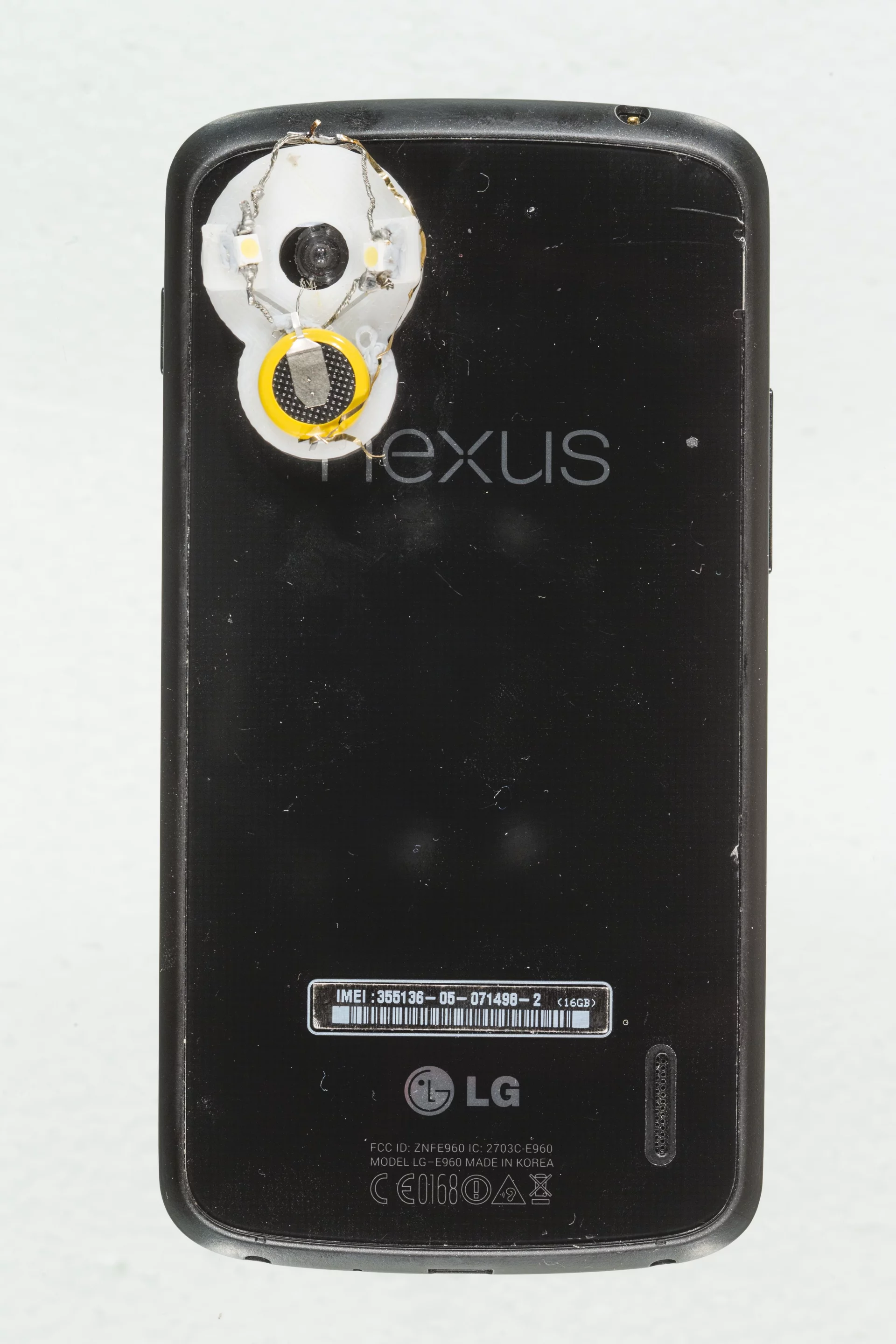 The prototype dermascope on a Nexus 4 smartphone