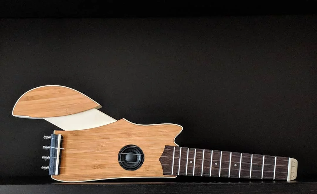 The Ava is 16 inches (40.6 cm) long and has lost its head in favor of a novel Turnkey Tuner system