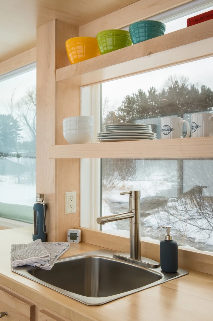 The glazing is very generous, which should help mitigate the claustrophobia of living in such a snug space