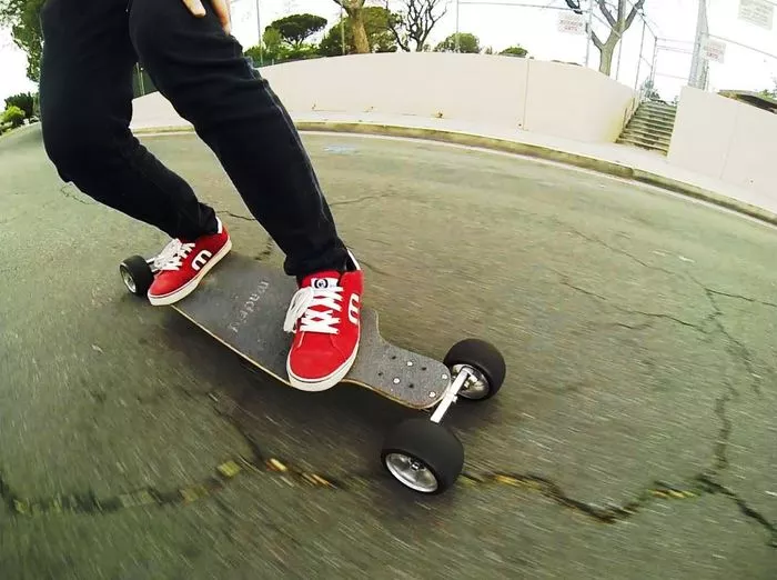 The Lean skateboard's large 120-mm wheels provide more stable riding over cracks