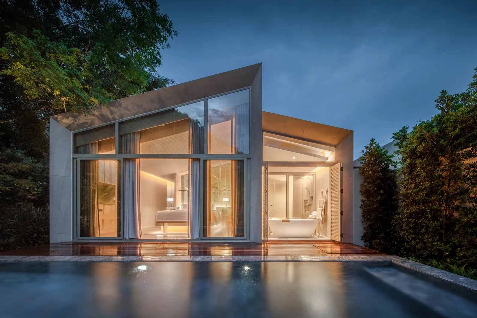 The hotel's rooms are like "small forest cabins," according to the architects