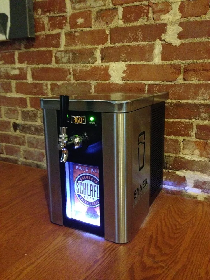 The small dispenser plugs into an electrical outlet to refrigerate your beer