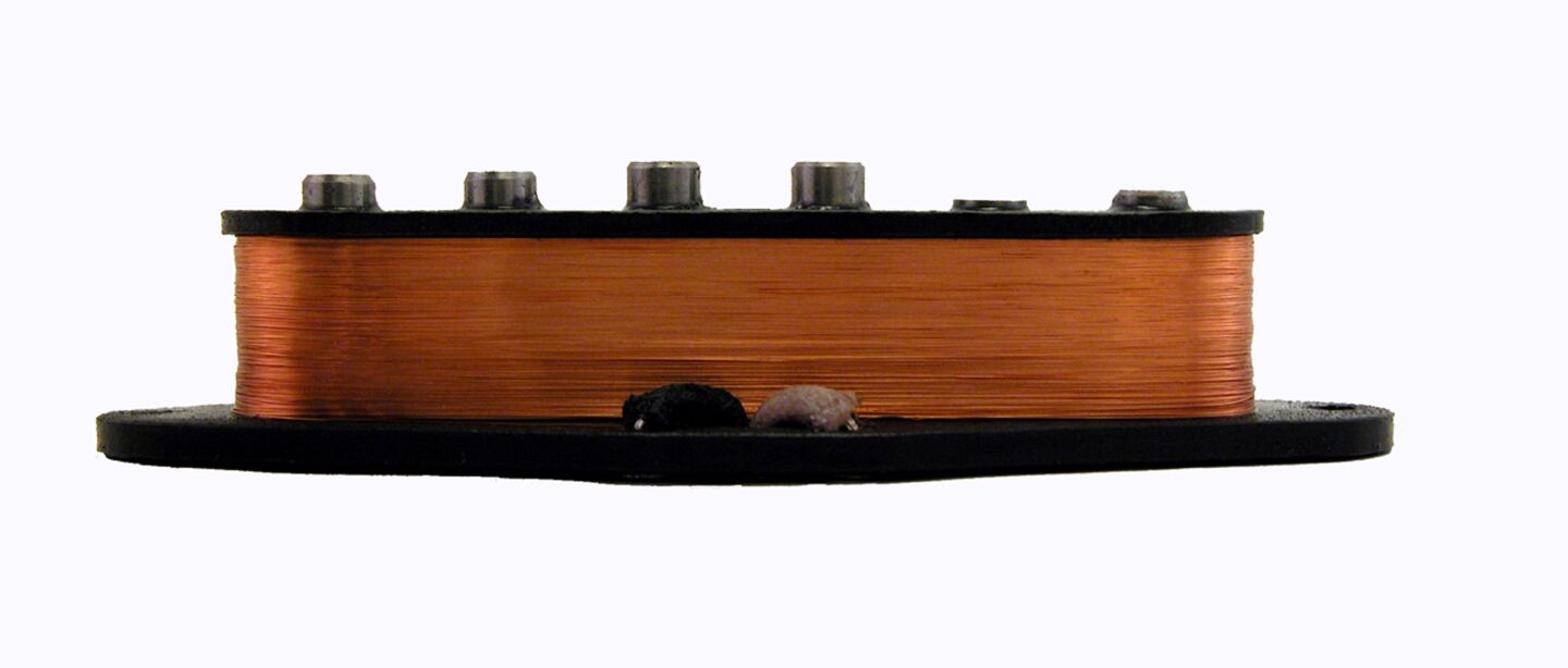 A standard mono guitar pickup - with a magnet, pickup poles and coiled wire