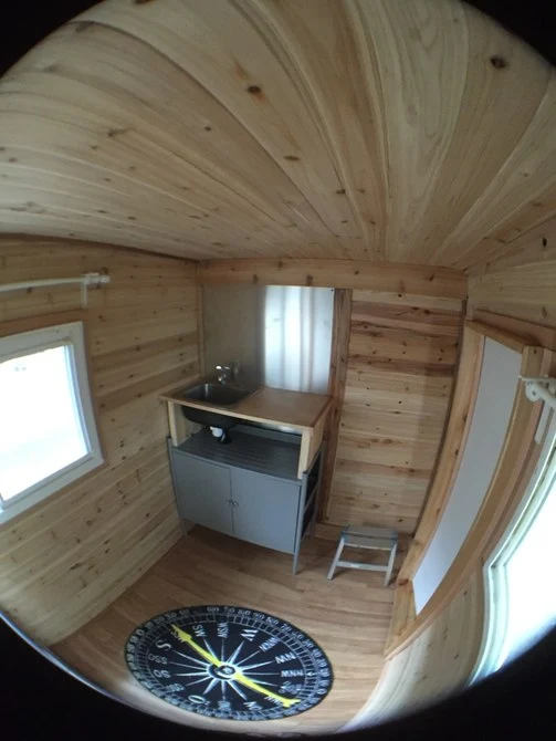 The Drifter's simple interior includes a Murphy bed and sink