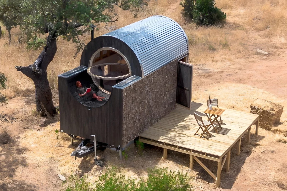 The Terra m1_Tiny House on Wheels features a small rooftop terrace