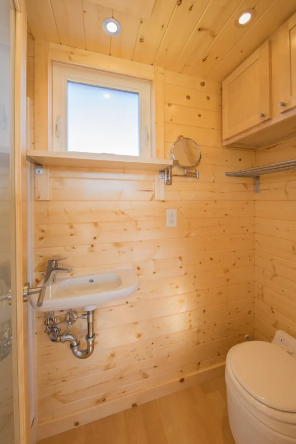 The bathroom in the Vista Sport includes a shower, sink, and toilet