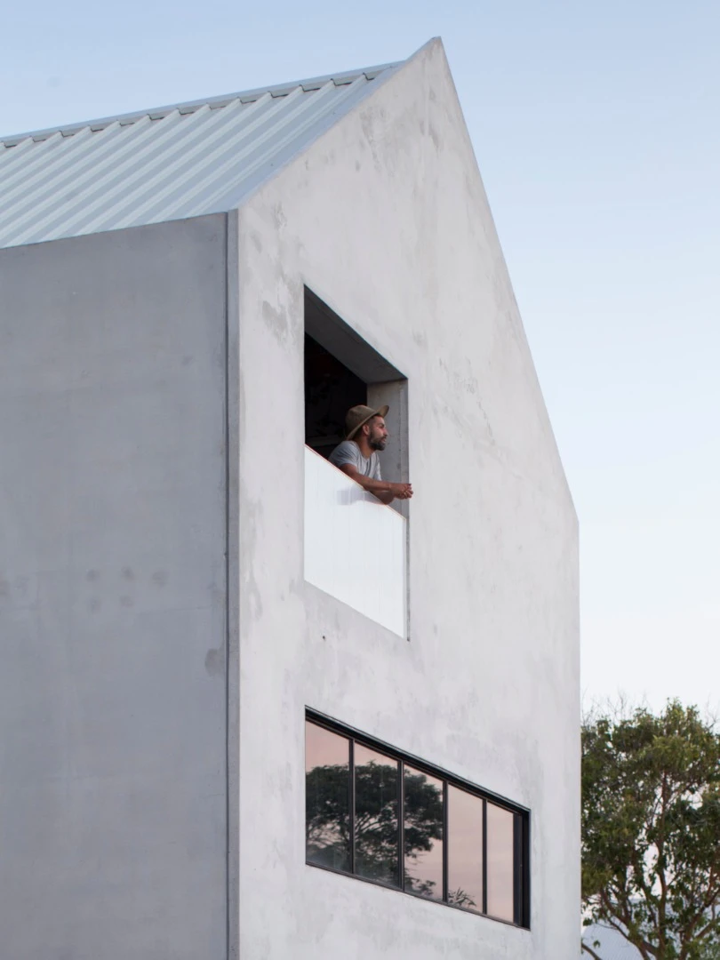 The home features recycled and reclaimed materials; passivhaus design, amble natural light and airflow, plus rooftop photovoltaic panels