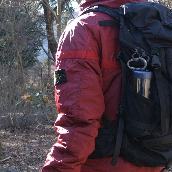 The Playful Base is sized to slide into the water bottle pocket of a backpack, keeping it easily accessible for drinking