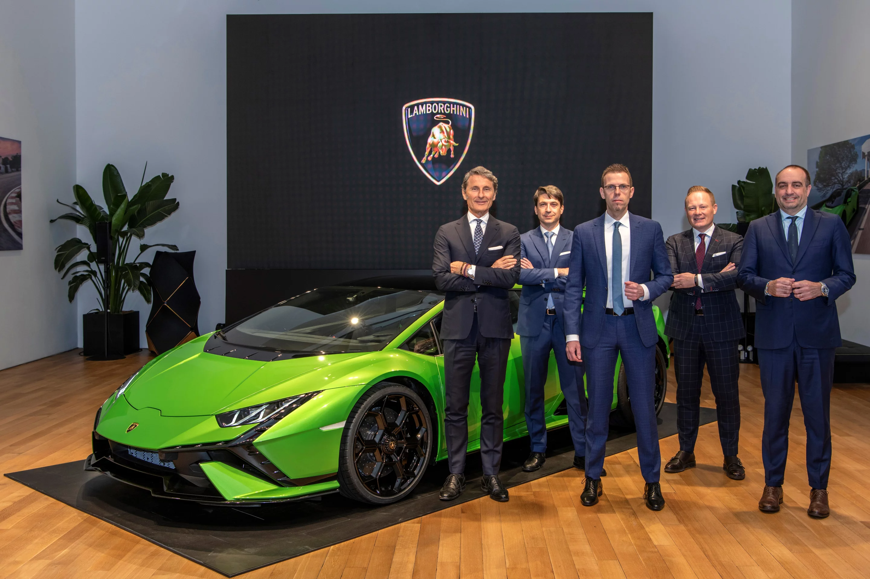 The Lamborghini executive team poses with the new Huracan Tecnica in New York