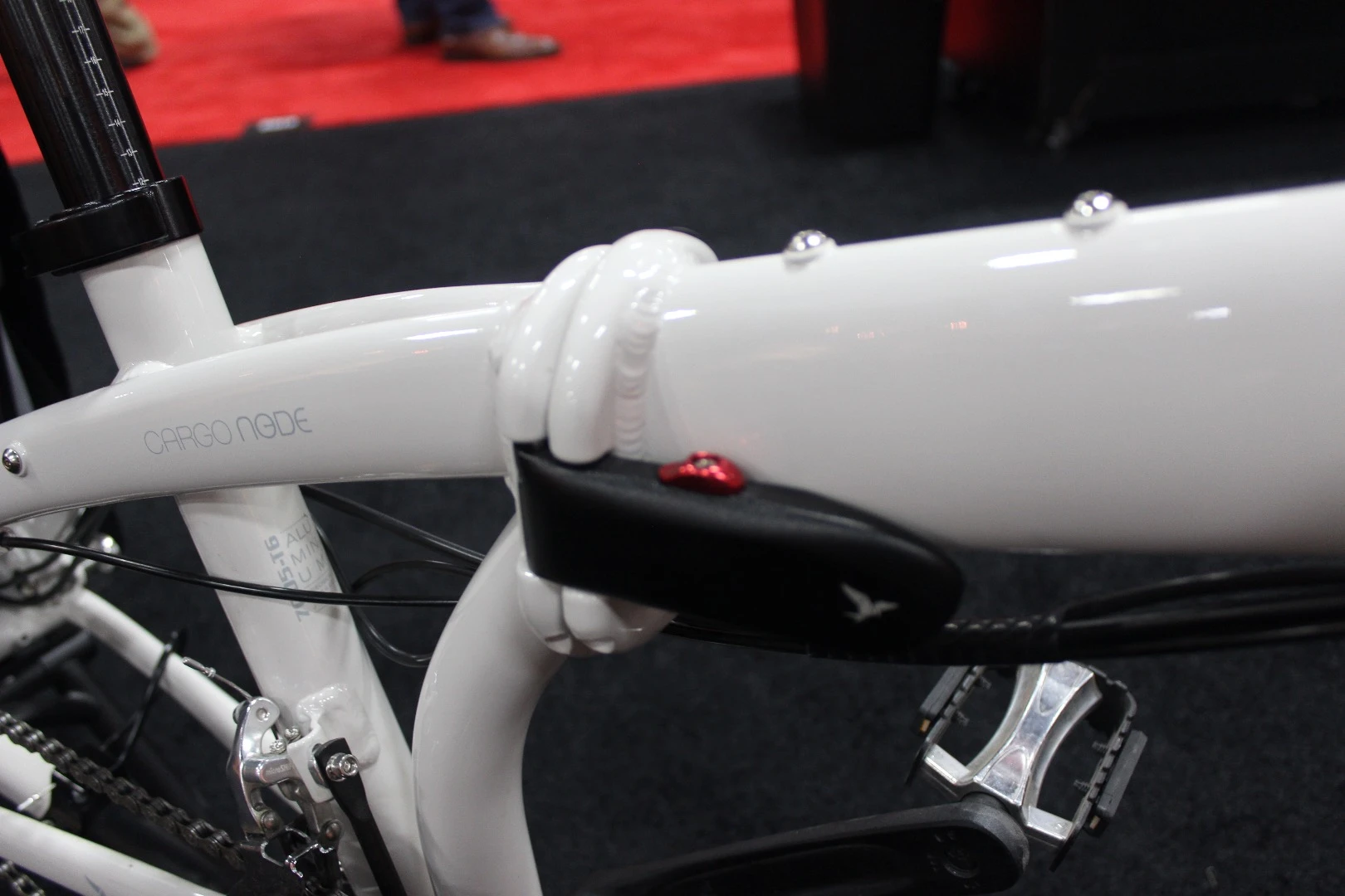 The Cargo Node folds in half by way of Tern's patented "N-Fold Technology"