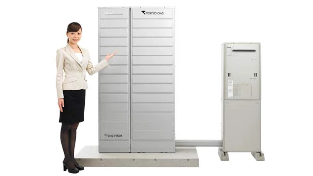 The new Ene-Farm home fuel cell (left) and accompanying hot water unit