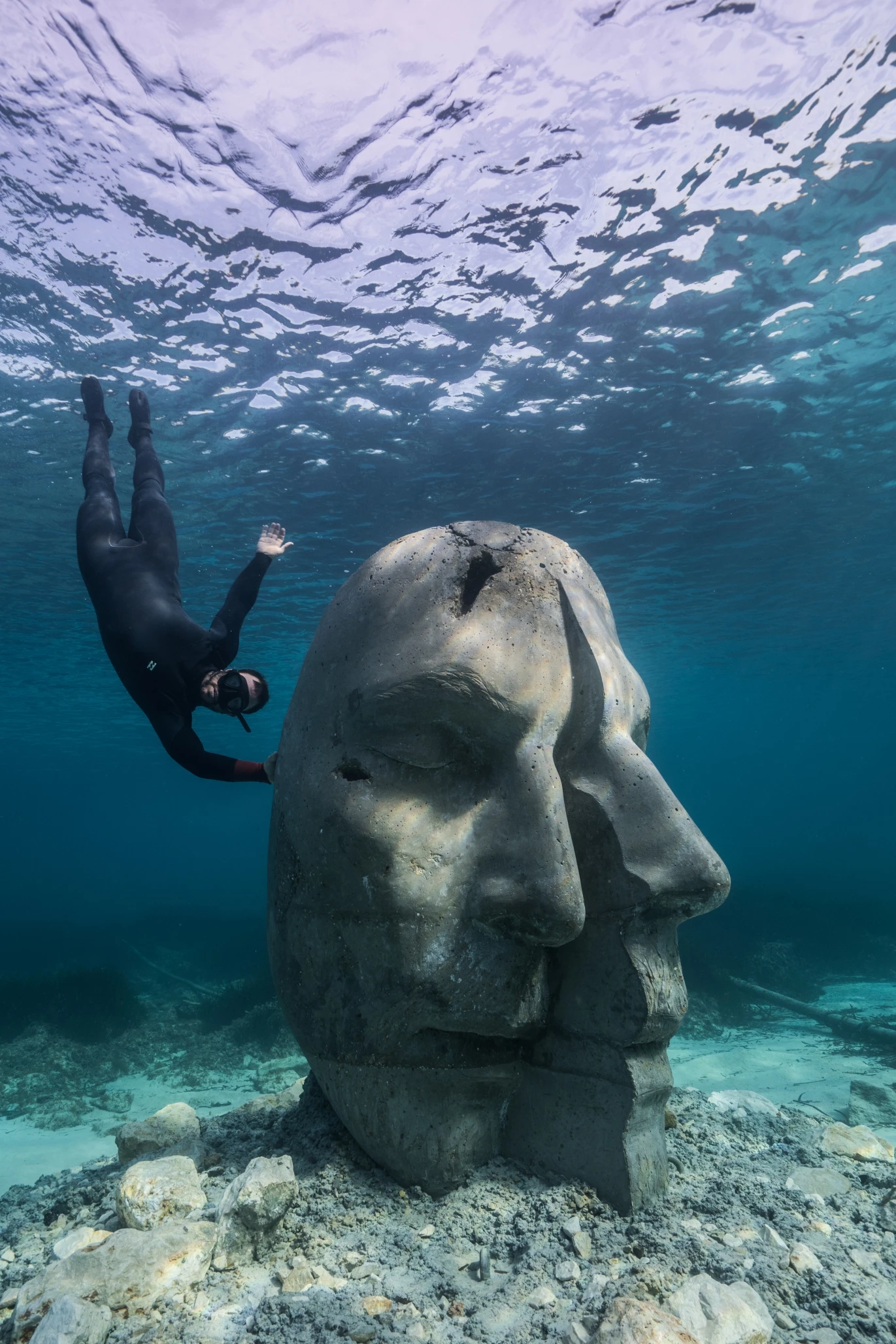 The Cannes Underwater Museum's sculptures measure over 2 m (6.5 ft) in height