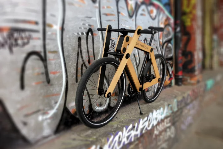 The wood-framed Sandwichbike is purchased flat-packed in a box, and is assembled by the buyer