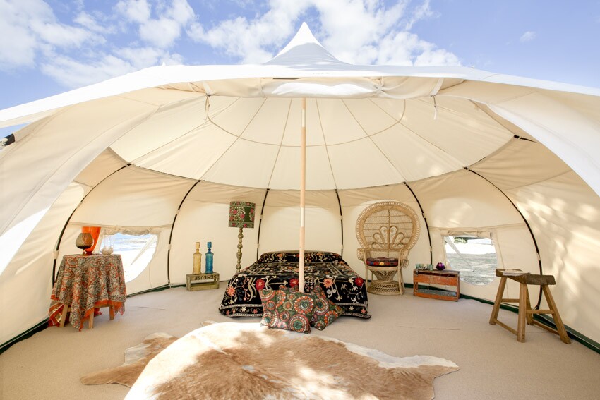Made from canvas, the shelter features mesh screens and large roof vents