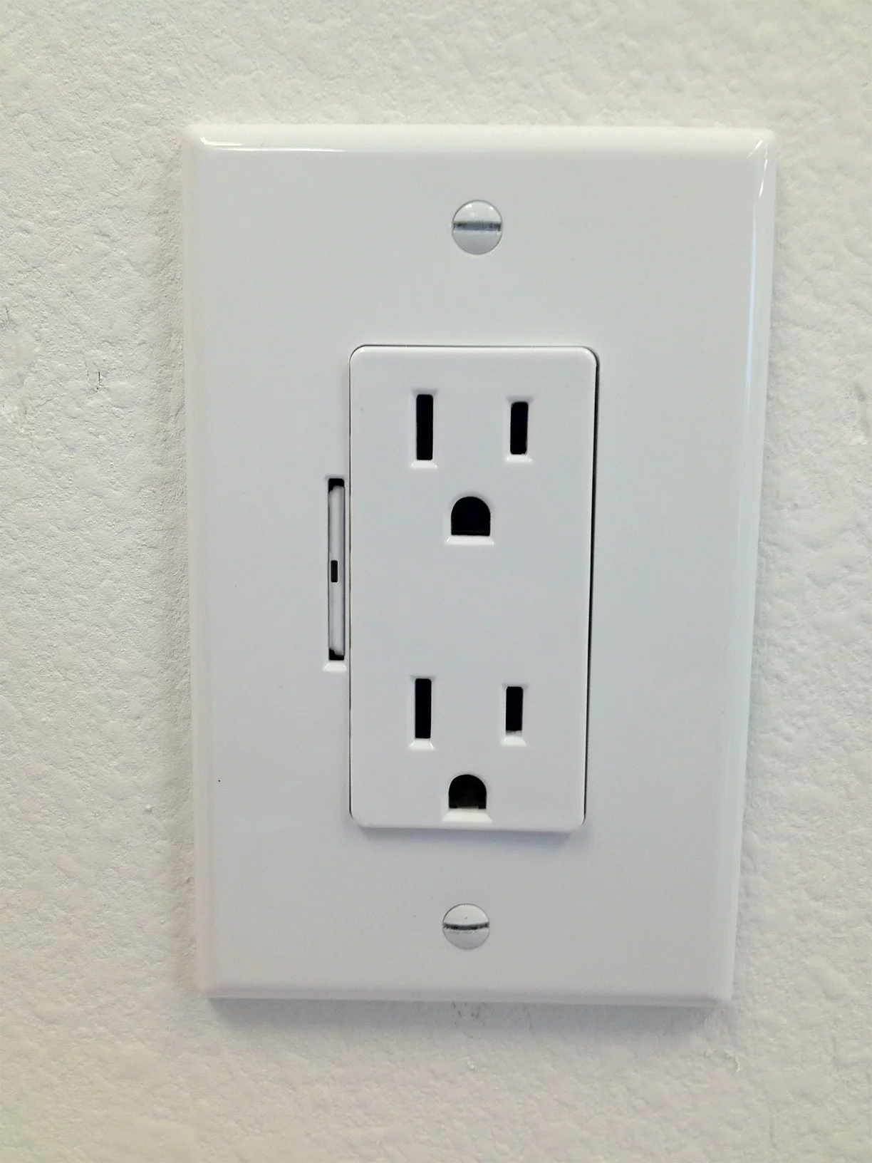 A wall outlet equipped with the Imp