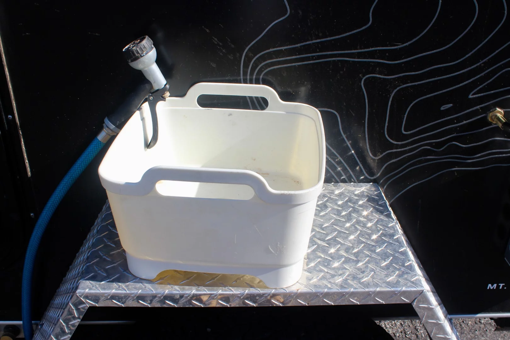 This makeshift dishwashing station proved quite functional, but the sprayer did have a tendency to get dirty in the dusty desert sand