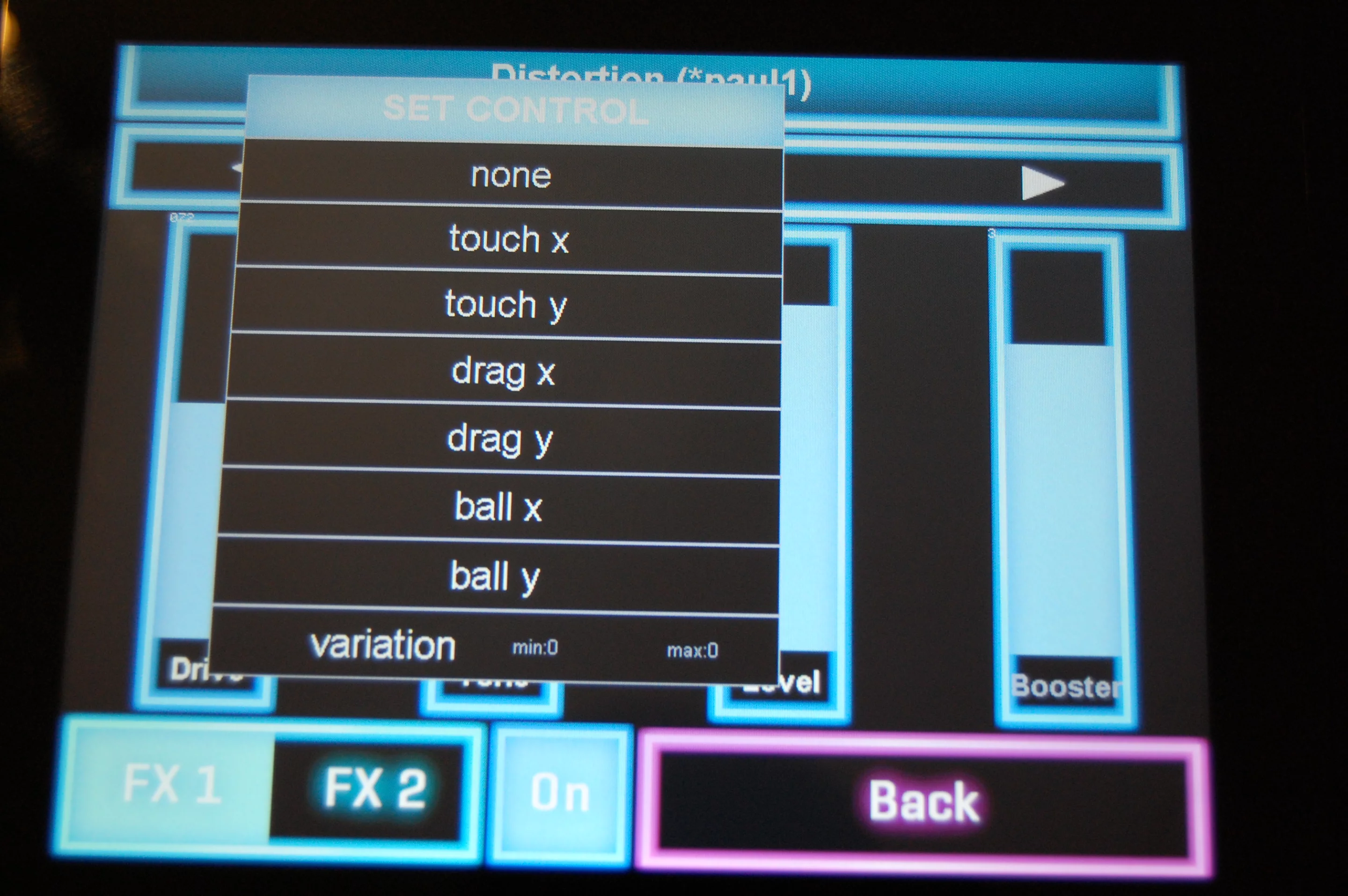 Tapping on the space at the bottom of the slider controls brings up a menu where you can assign actions to the touch panel