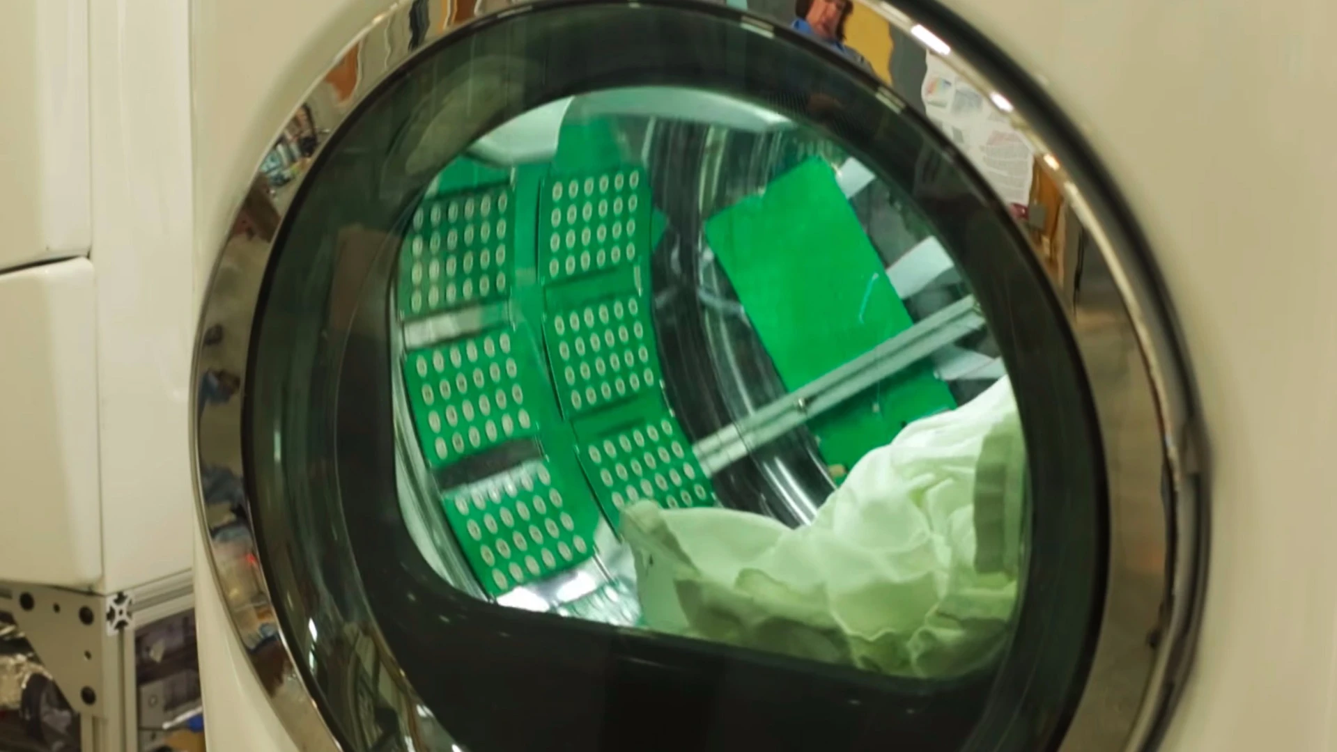In a step towards commercial availability, ORNL researchers have integrated their ultrasonic drying technology into a clothes dryer drum