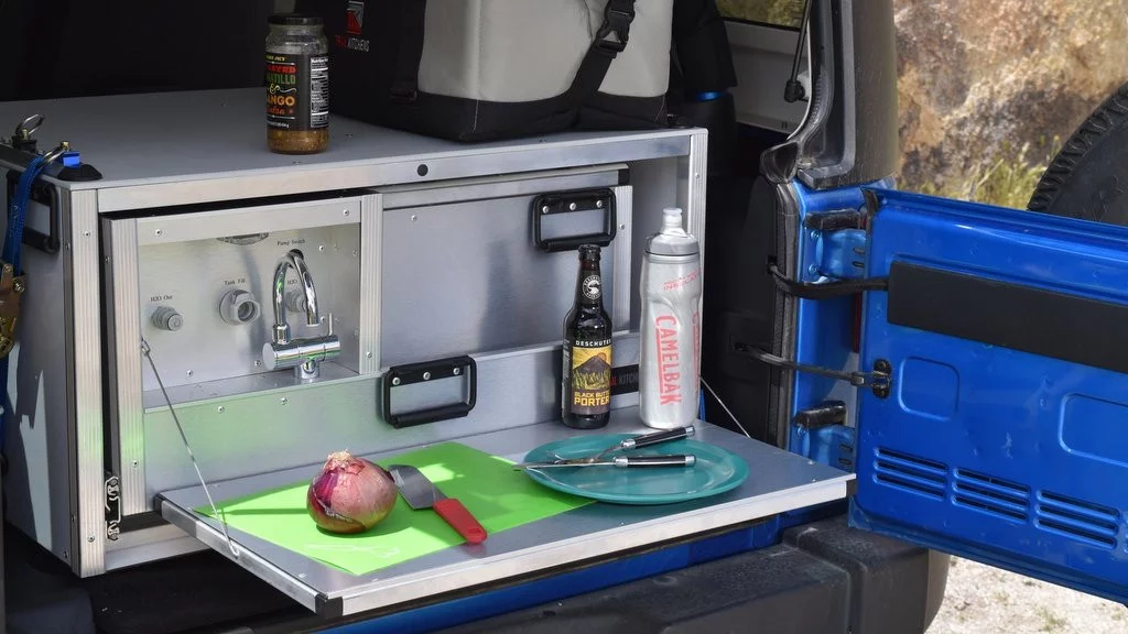 The drop-down shelf works for simple snacks or tailgates