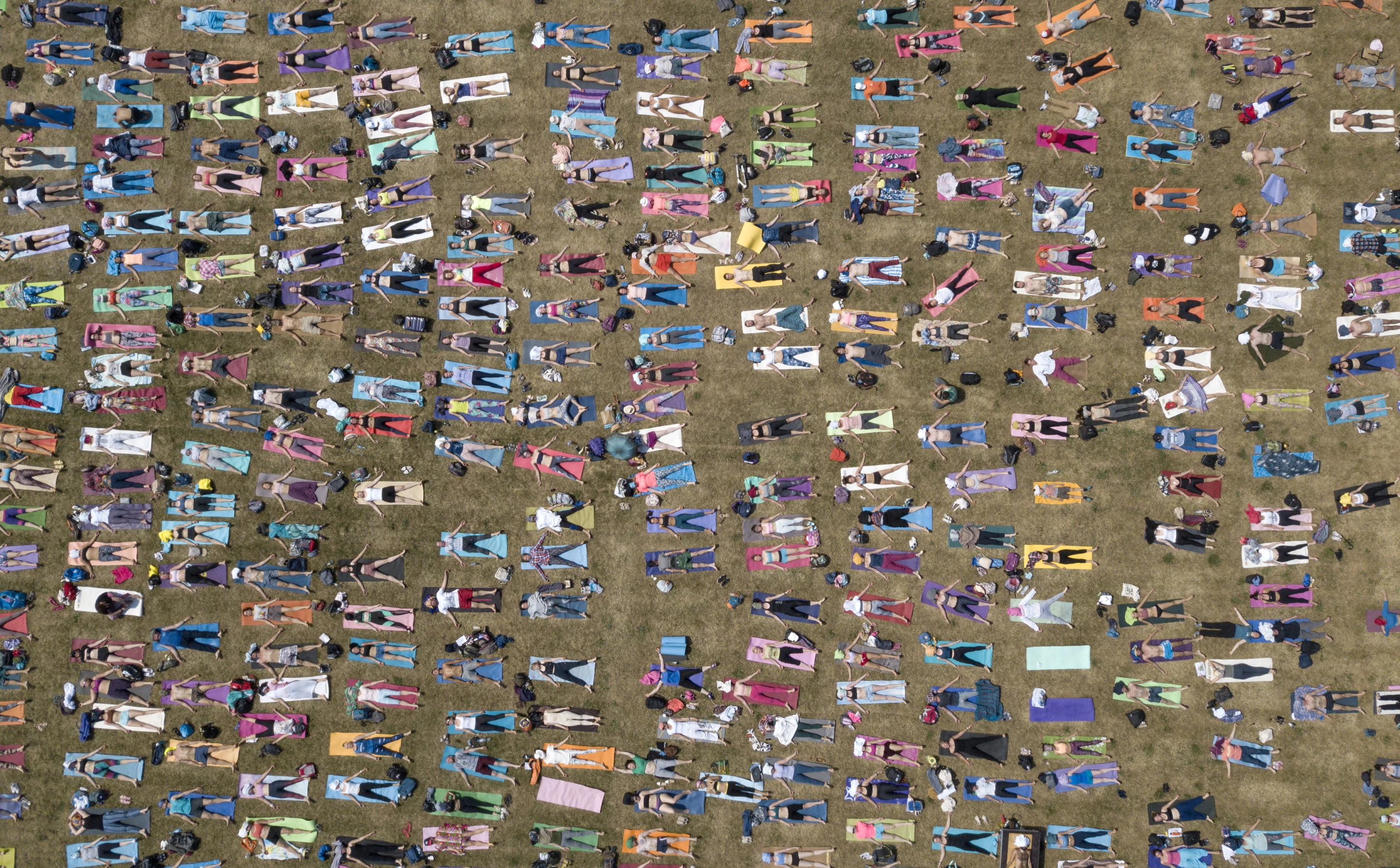 Shortlist, Street Photography, Mass Yoga Training in Park. People attending a yoga session in Tsaritsyno Park, Moscow, Russia, to mark International Day of Yoga on 23 June 2019