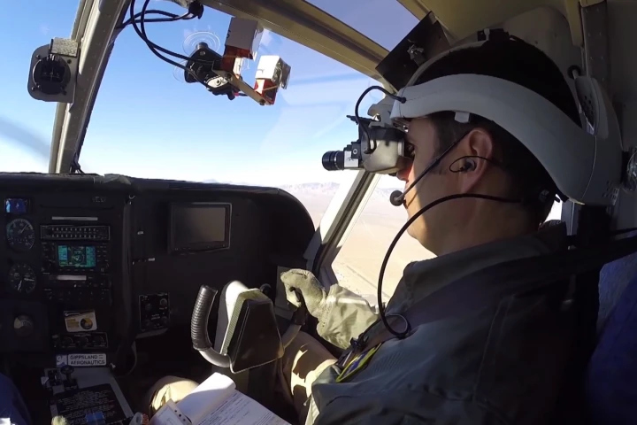 Scott Howe performs a task with the Fused Reality system