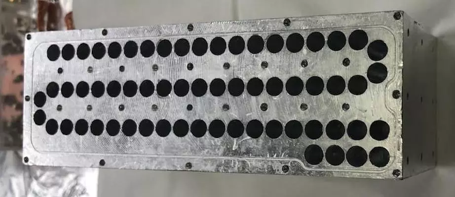 The quantum flute is a piece of metal with holes drilled in it, which can trap and manipulate photons of different wavelengths to encode quantum information