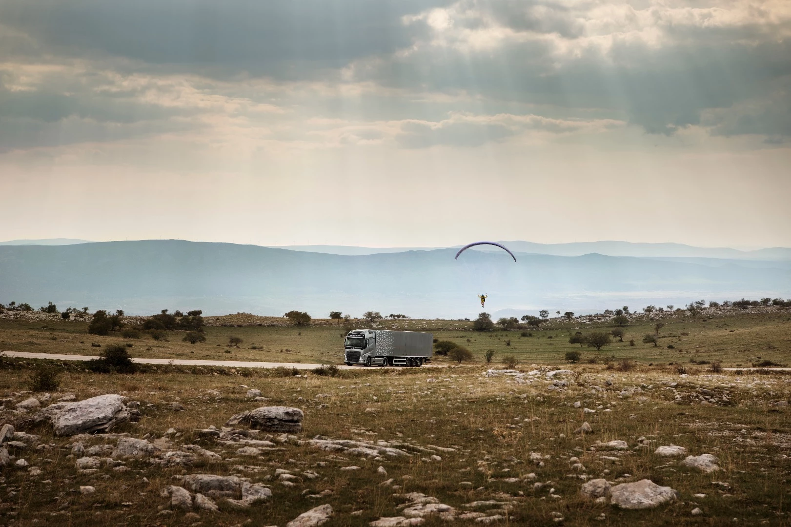 It's not everyday you see a paraglider being towed by a truck