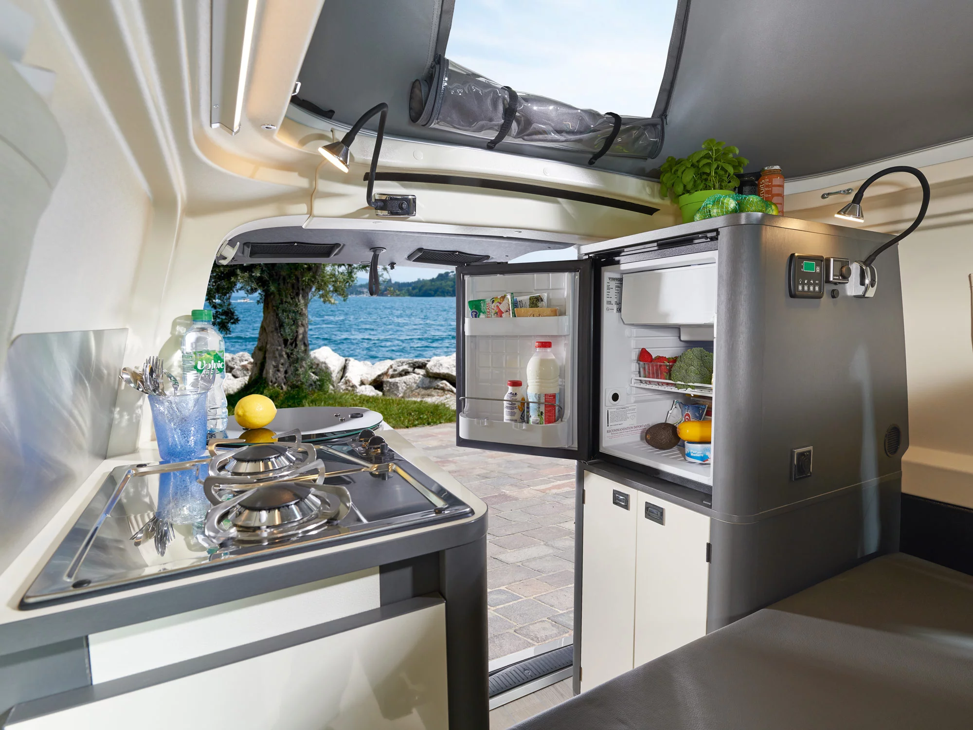 The 51-L compressor fridge stands atop a compact clothes closet