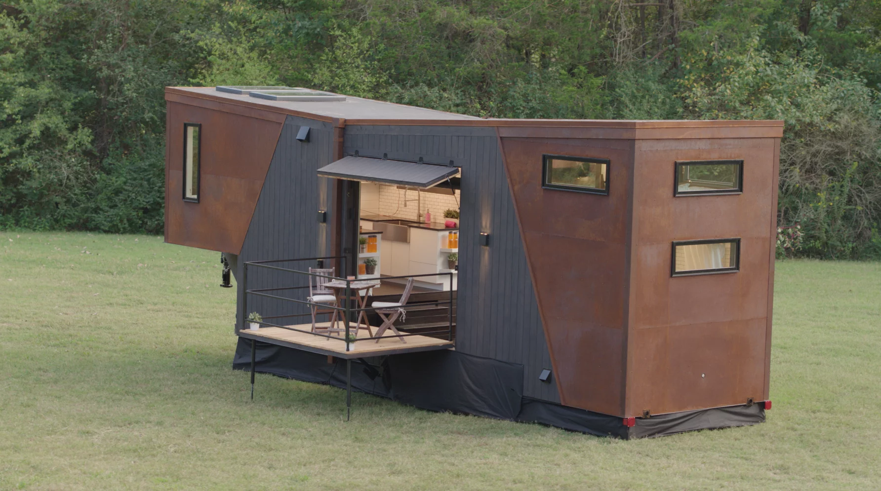 The Home That Runs on Dunkin' appears to be based on New Frontier Tiny Homes' Escher model
