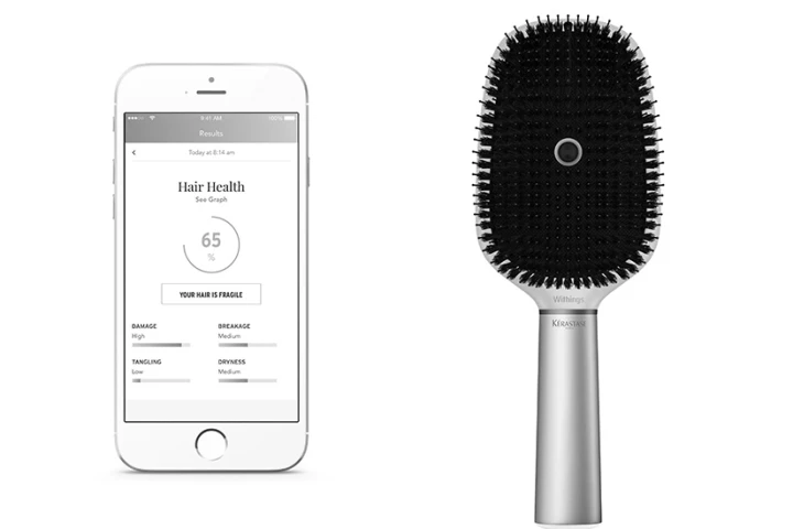 The battery-powered brush is splash-proof and is said to work with a variety of hair types