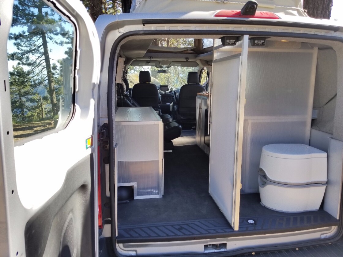 The toilet room can be accessed from inside or out, and we reckon the outside door can be used as a way to air it out