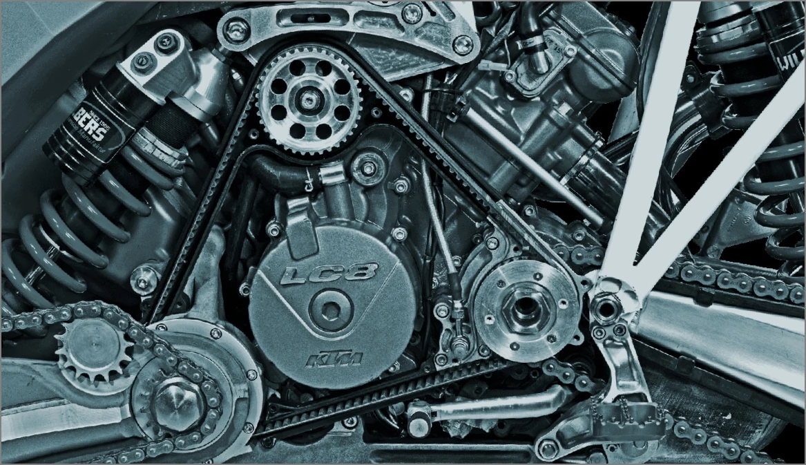 A belt drive transfers power from the gearbox output shaft of the Projekt DT-A