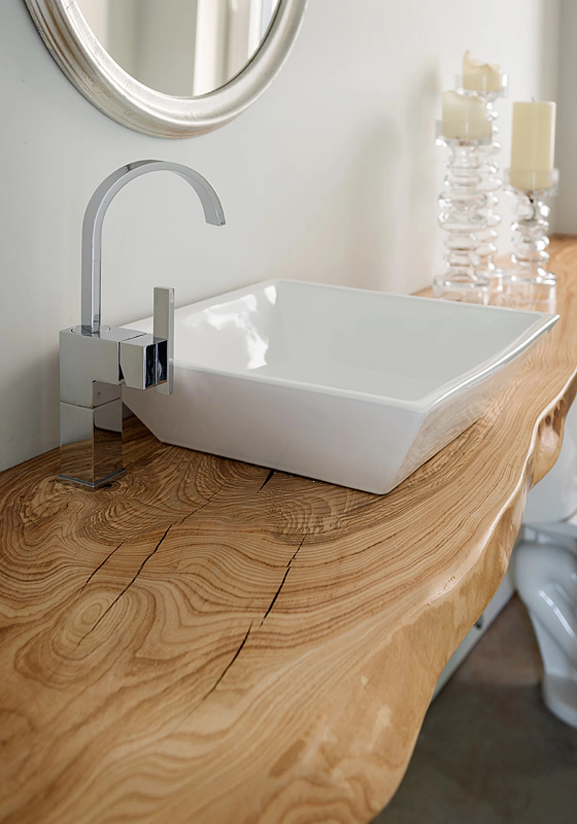 A salvaged tree was used for the staircase, wall paneling, and bathroom counter top (Photo: Aaron Leitz)