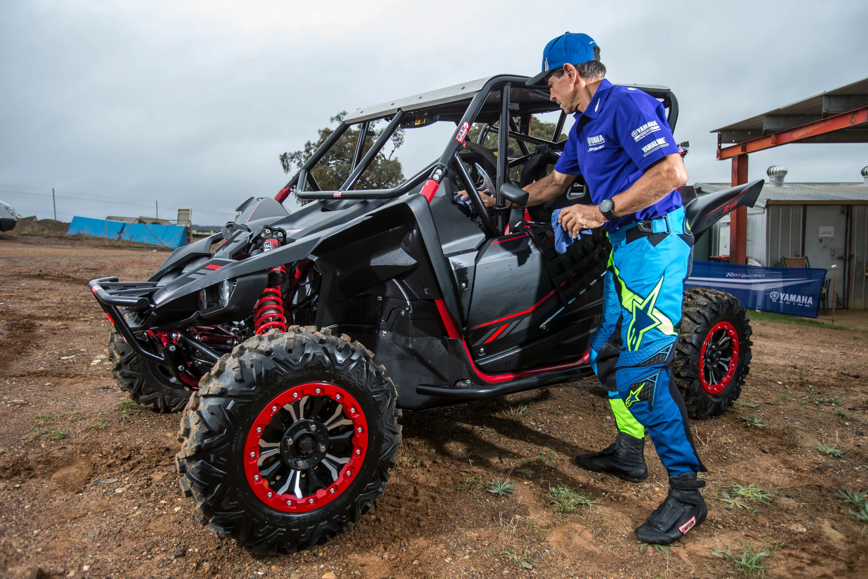 "Mr. Motocross" legend Stephen Gall takes a moment to wipe some dust off theYamaha YXZ1000R SS SE.