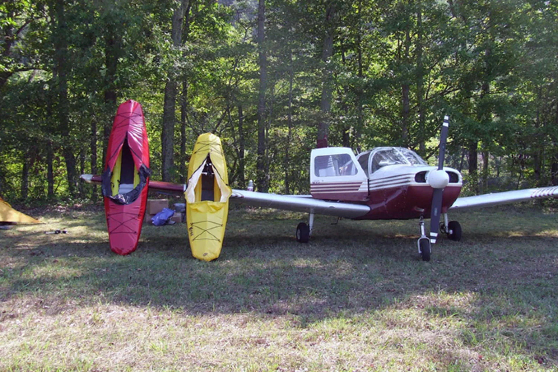 Backpackable boat unfolds and inflates into paddling form
