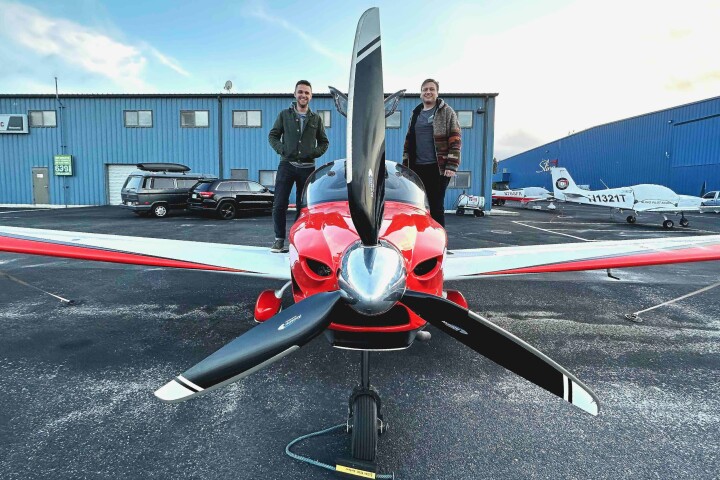 Airhart Aeronautics lead flight software engineer Soren Rademacher (left) and CEO/co-founder Nikita Ermoshkin (right) with the Airhart Sling prototype