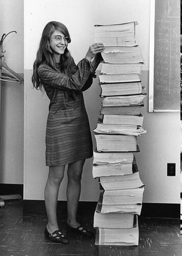 Margaret Hamilton, one of the few women on the AGC programming team with the software printoout