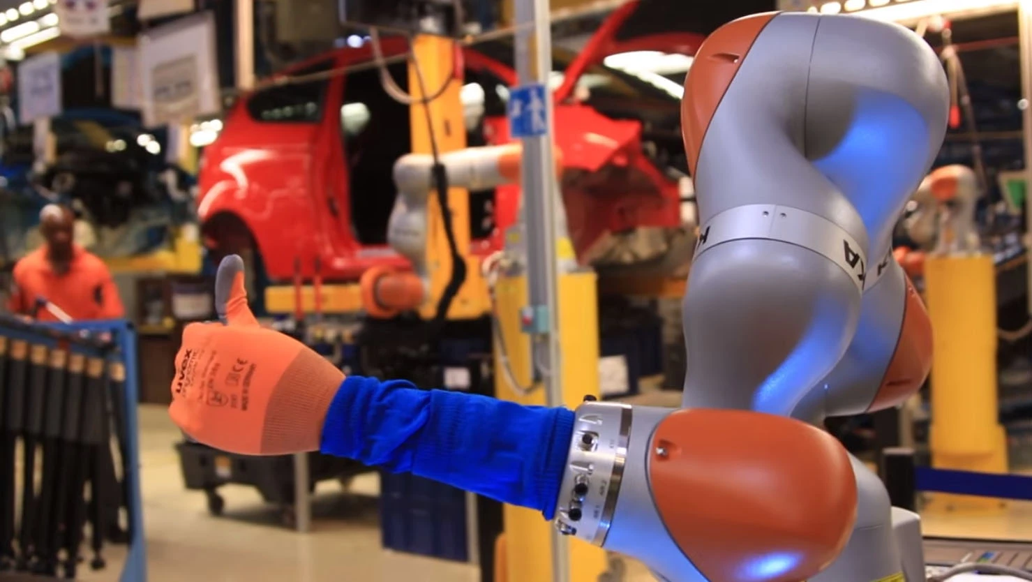Ford is putting humans and robots side-by-side in Cologne