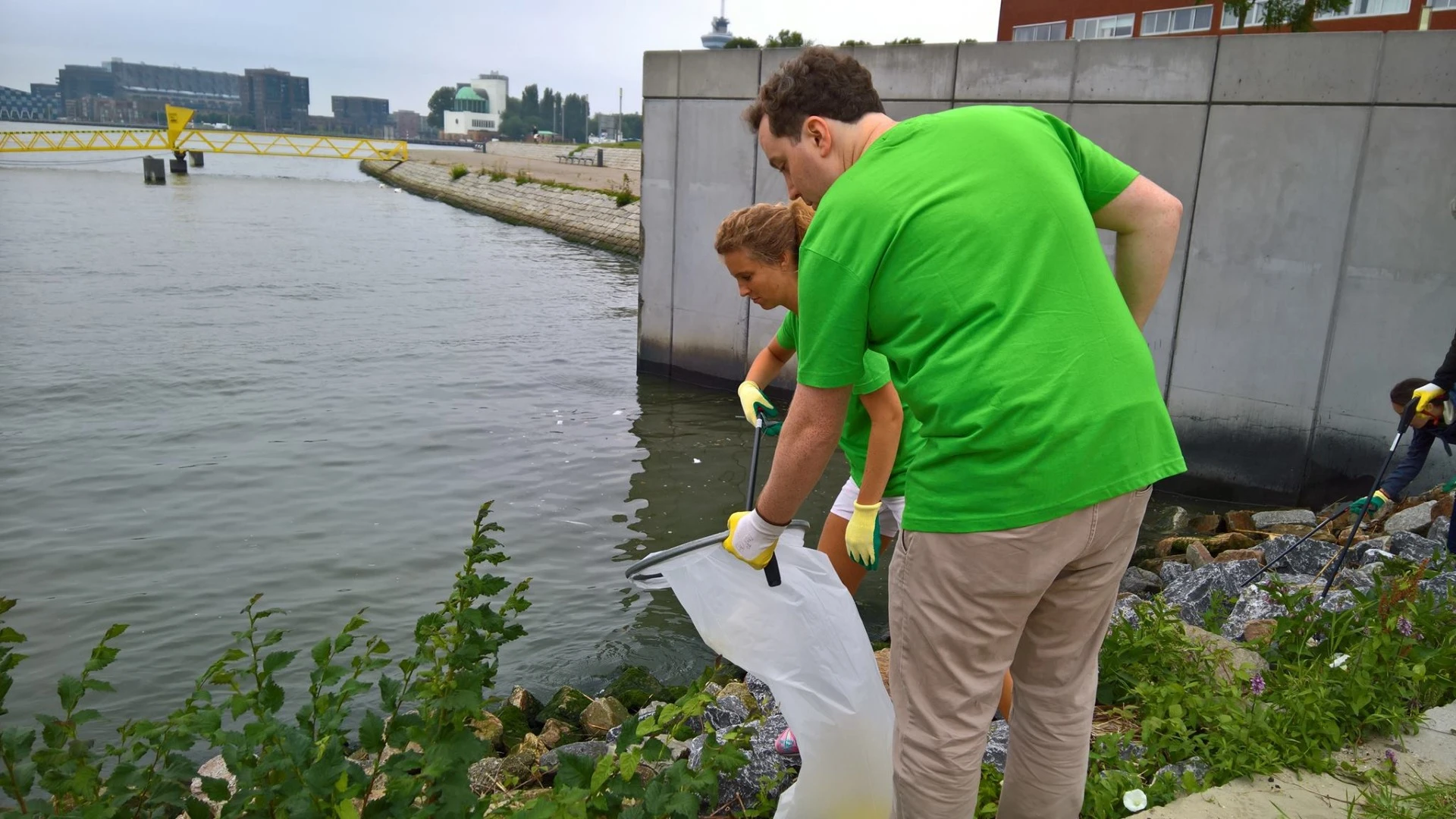 Volunteers collected waste plastic from riverbanks for recycling into hexagonal blocks that make up the Recycled Park