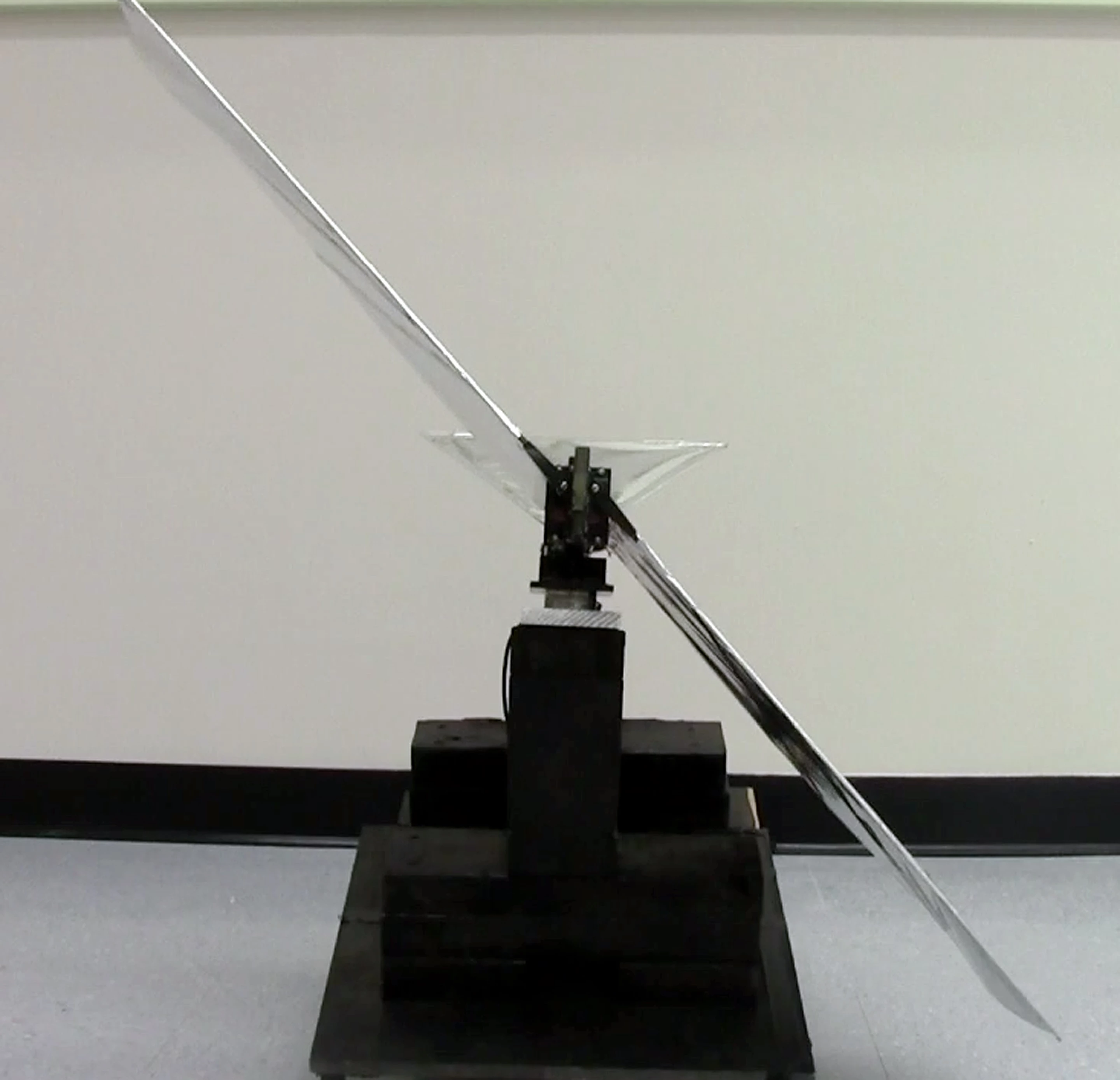 Robo Raven gets in a flap with real-life hawk