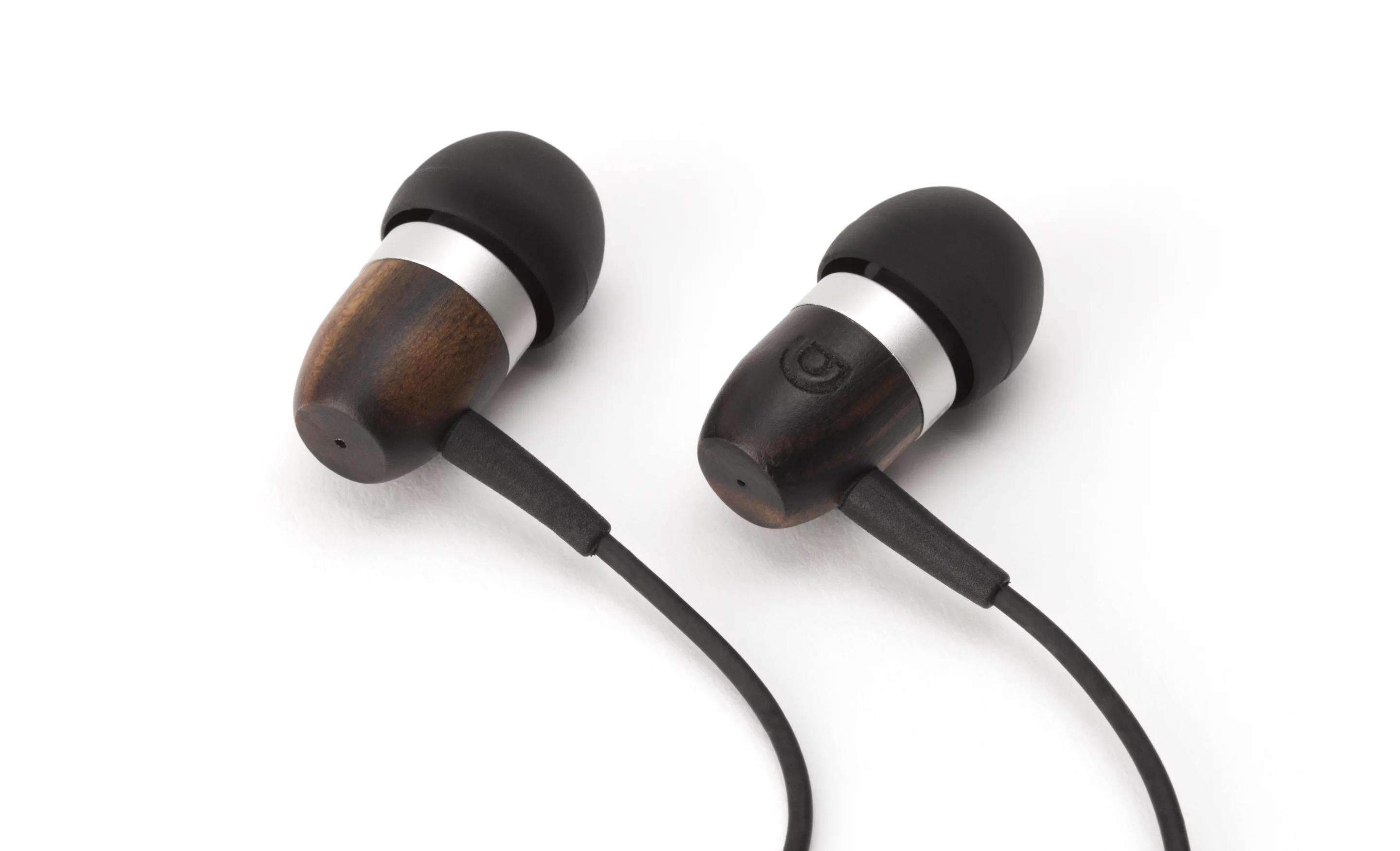 The outer housing of the WoodTones Earbuds is made from bits of exotic scrapwoods rescued from the workshop floors of furniture and cabinet makers