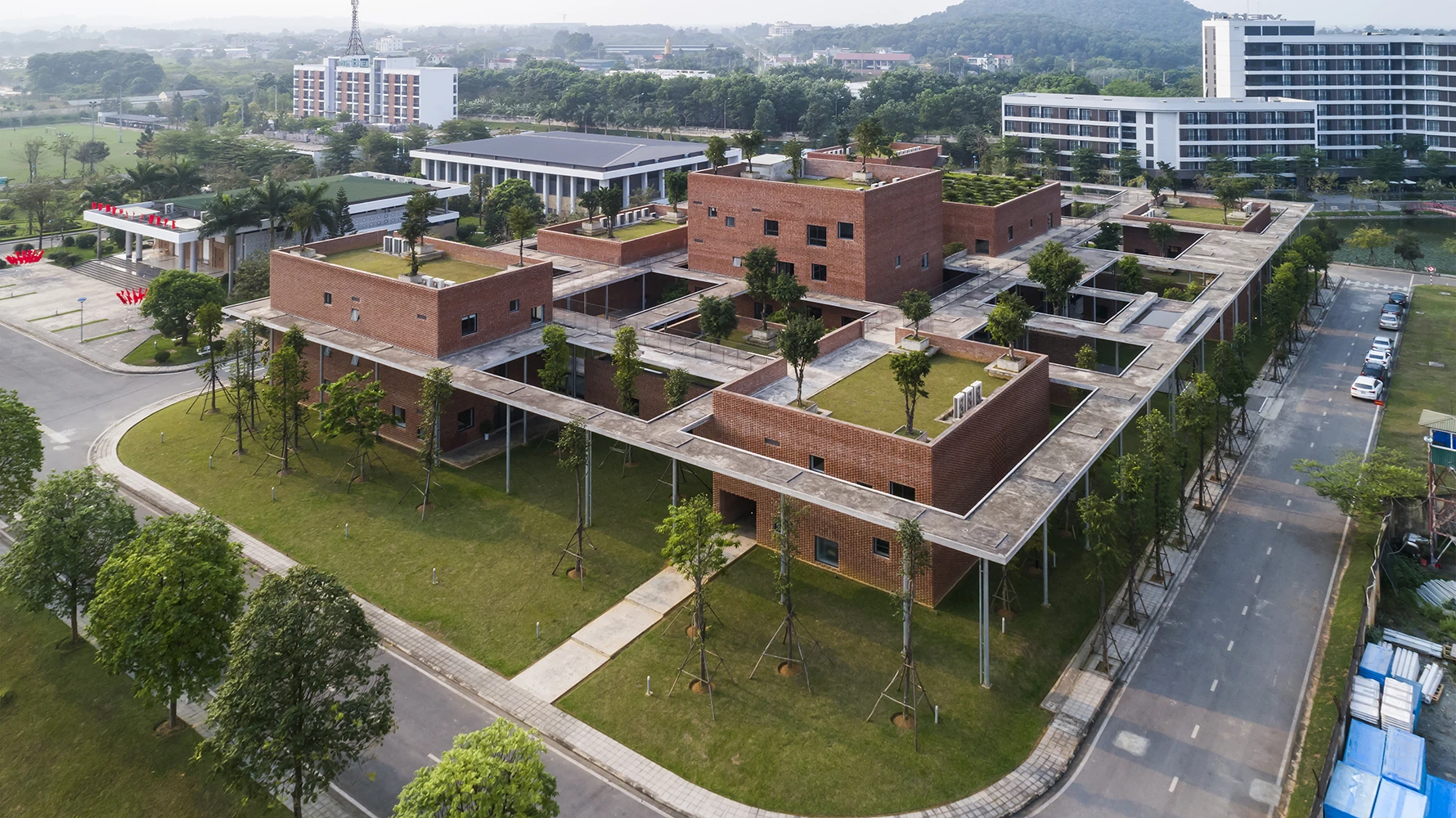 The Viettel Offsite Studio is situated next to the Viettel Academy Educational Centre, shown, also designed by VTN Architects