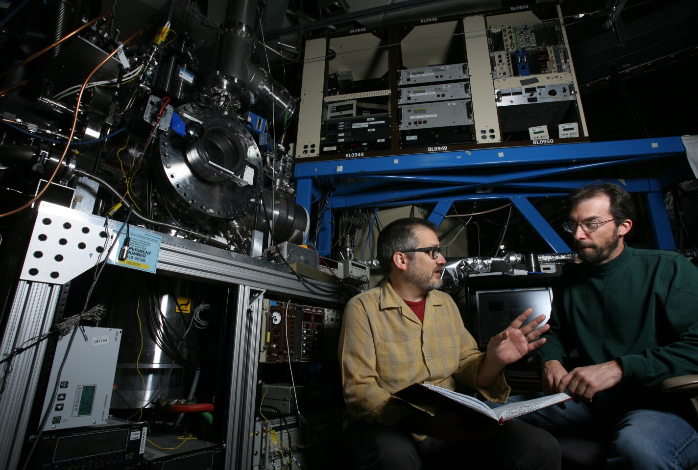 Sandia combustion researchers Craig Taatjes, left, and David Osborn with the apparatus used to detect Criegee biradicals (Photo: Dino Vournas)