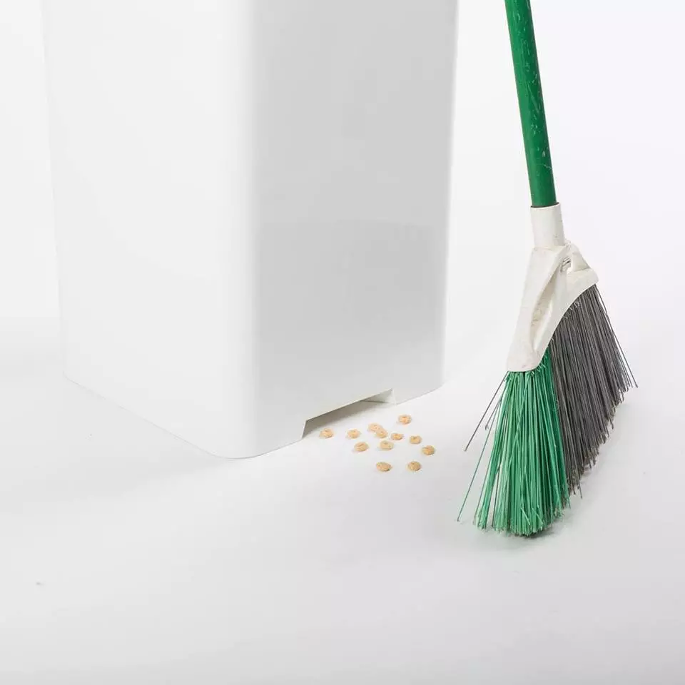 The Bruno garbage can automatically vacuums up whatever is swept into its suction port