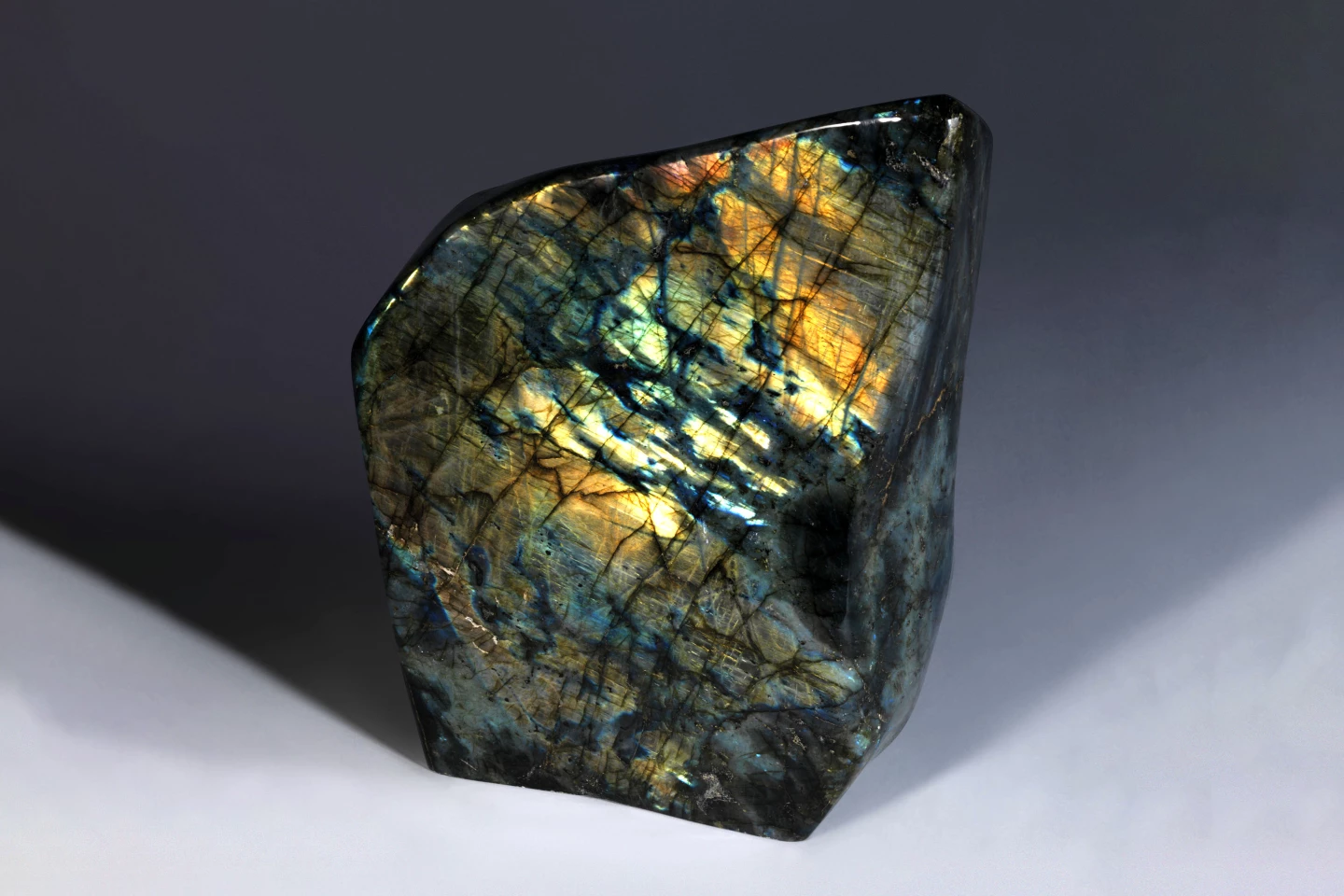 This free-form specimen of Labradorite is polished on all sides and measures 13 x 9 x 4 inches (33 x 23 x 10cm)